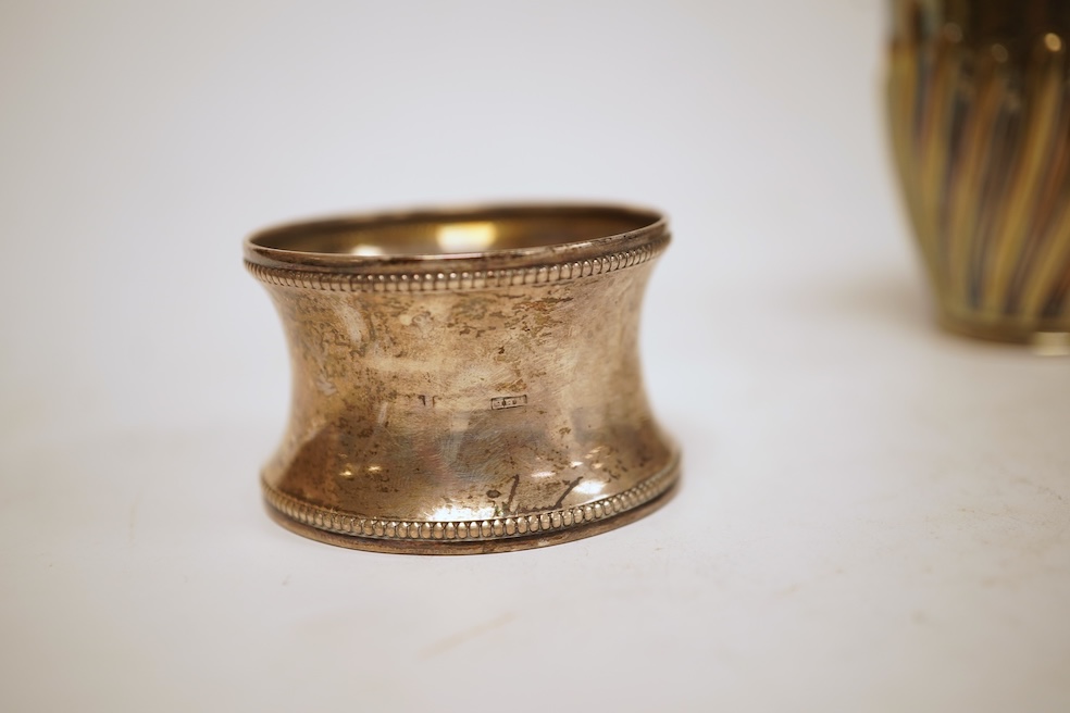 A late Victorian demi-fluted cream jug and sugar bowl, Charles Stuart Harris, London, 1888, together with cased silver christening egg cup, spoon and napkin ring and two other silver napkin rings.